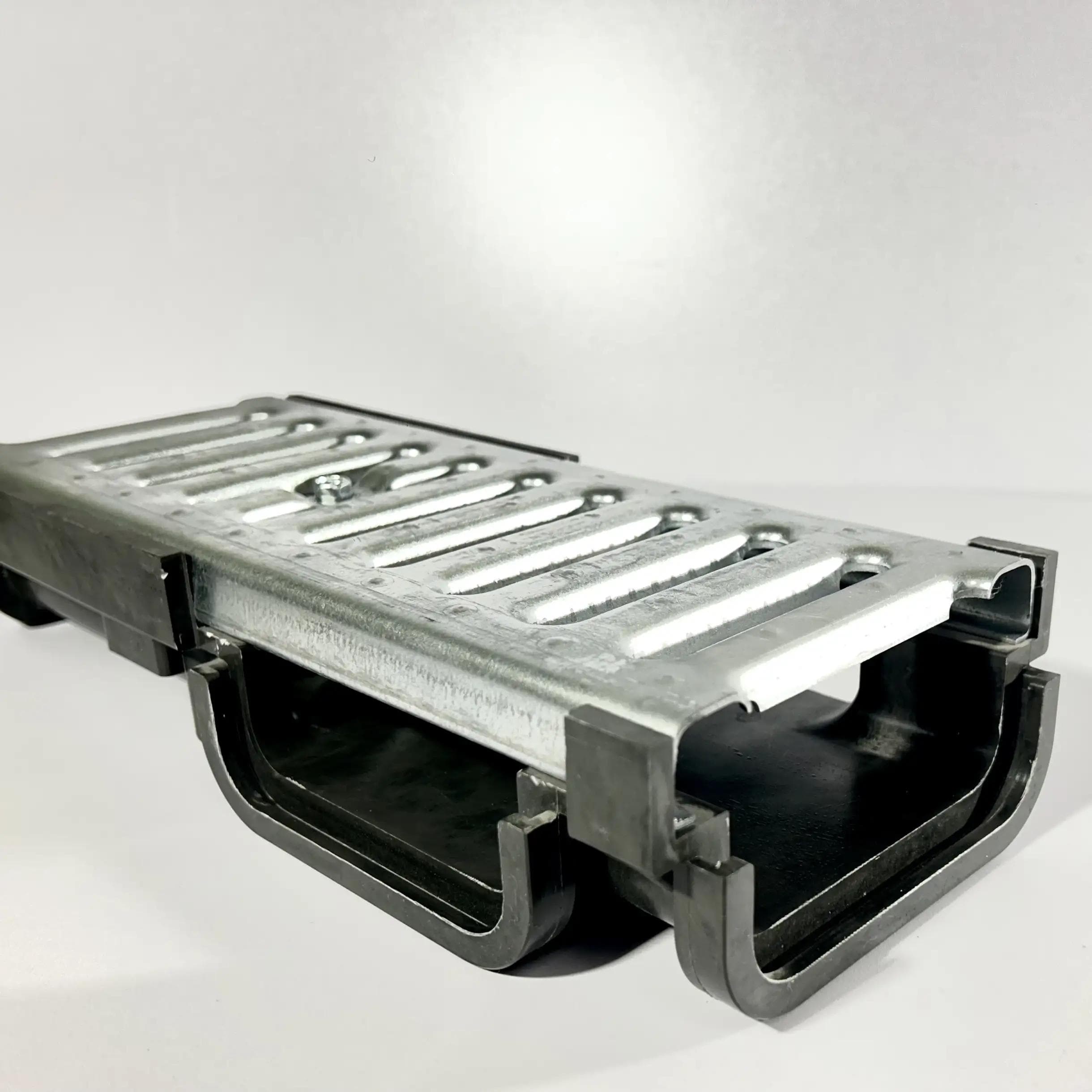 100/6V - hjørneløsning med spalterist A15. Koksgrå