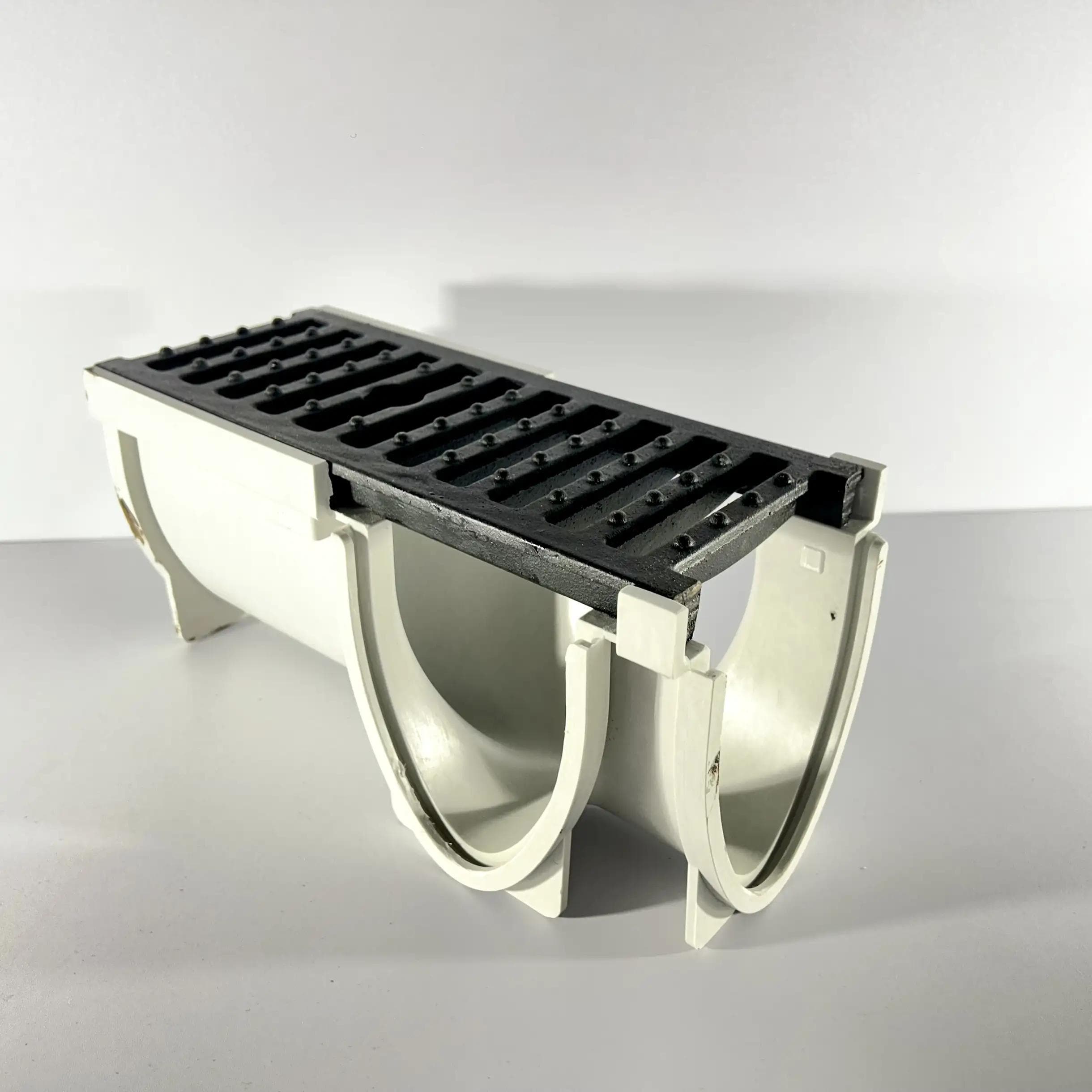 100V line hjørneløsning m/støpejernsrist. Lys grå