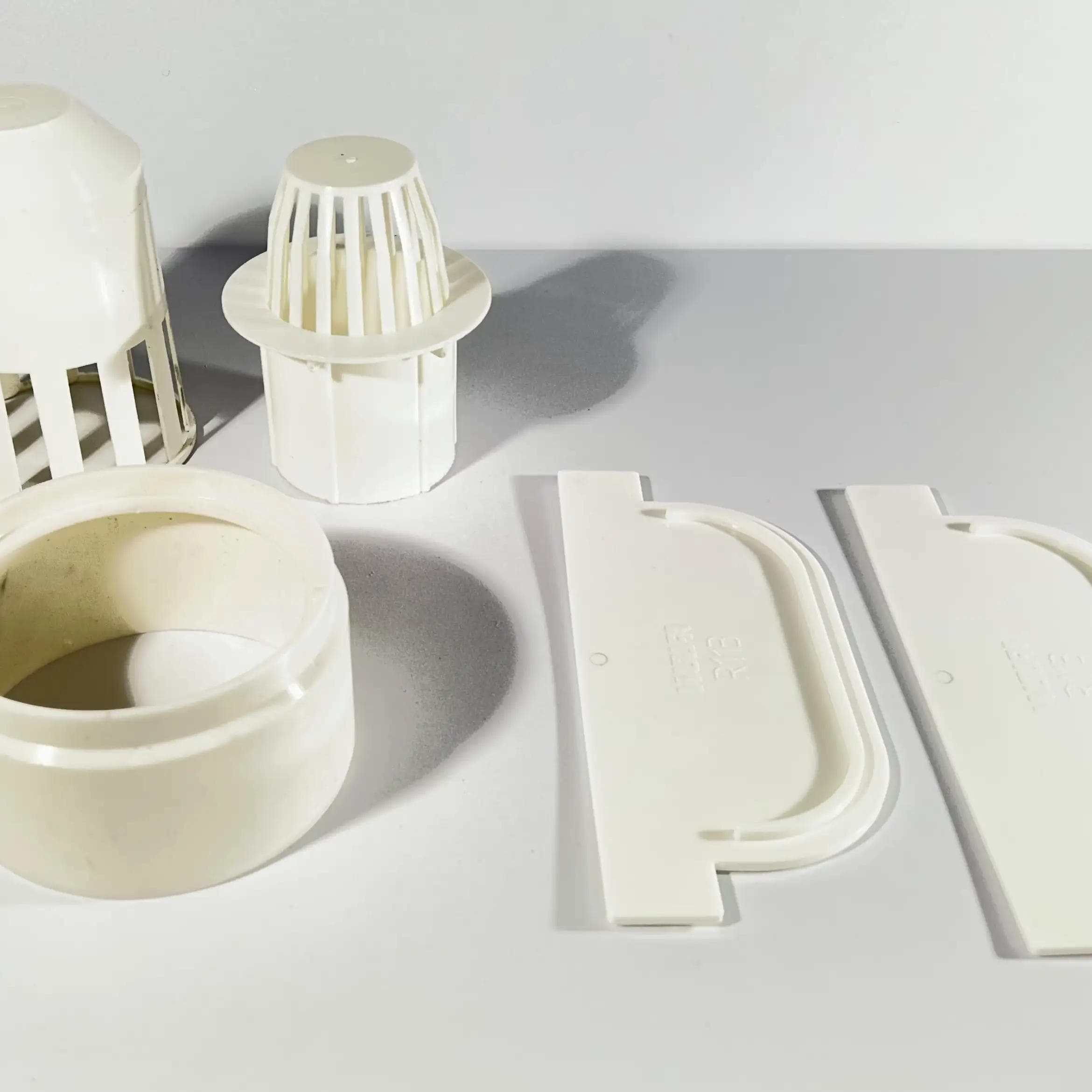 150F - utløpsstuss med oppsamler - Ø125. Lys grå